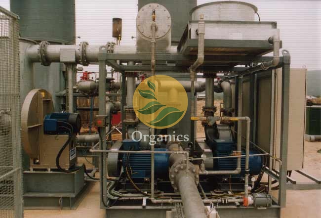 Close-up of flame arresters and condensate knockout pot on a landfill gas skid