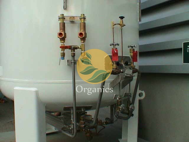 Close-up of valve and piping assembly on a cryogenic liquid methane storage vessel