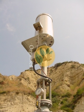 Close-up view of the burner tip and control panel on an AC Range flare unit